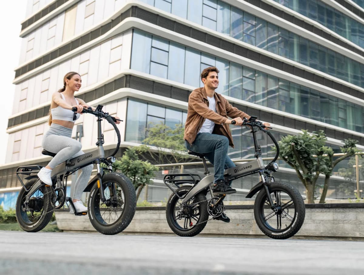 Person with Luckeep e-bike by the river